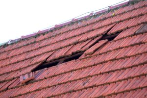 Home roof damage after storm