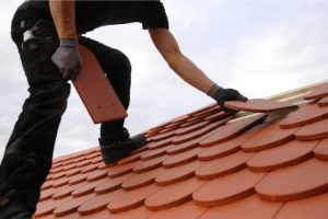 Roofing work new covering of a tiled roof